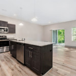 Open living area with wood plank flooring