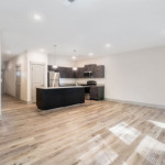 Open living area with wood plank flooring