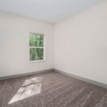 Carpeted bedroom